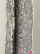 广州一业主发现墙体有大量泡沫 开发商称是轻质